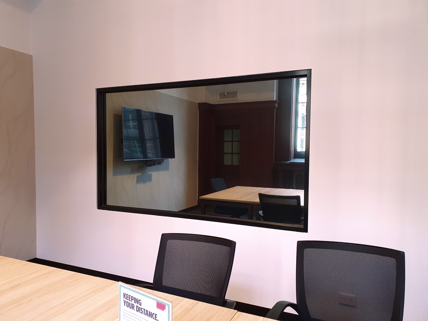 Mirror in a Office Conference room